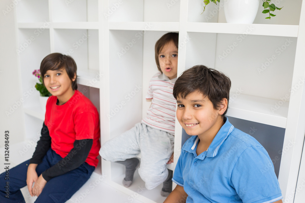 Happy children having fun and posing in new modern home Happy children having fun and posing in new modern home