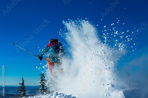 Skier on off-piste slope in forest riding very fast. Ski backcountry resort Sheregesh. © trofimov_pavel