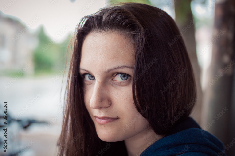 portrait of the young girl the brunette close up portrait of the young girl the brunette close up