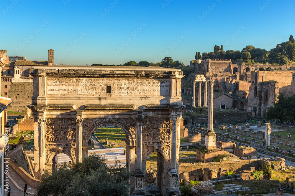 Rome, Italy. Arch of Septimius Severus (203) and the ruins of the Roman Forum Rome, Italy. Arch of Septimius Severus (203) and the ruins of the Roman Forum