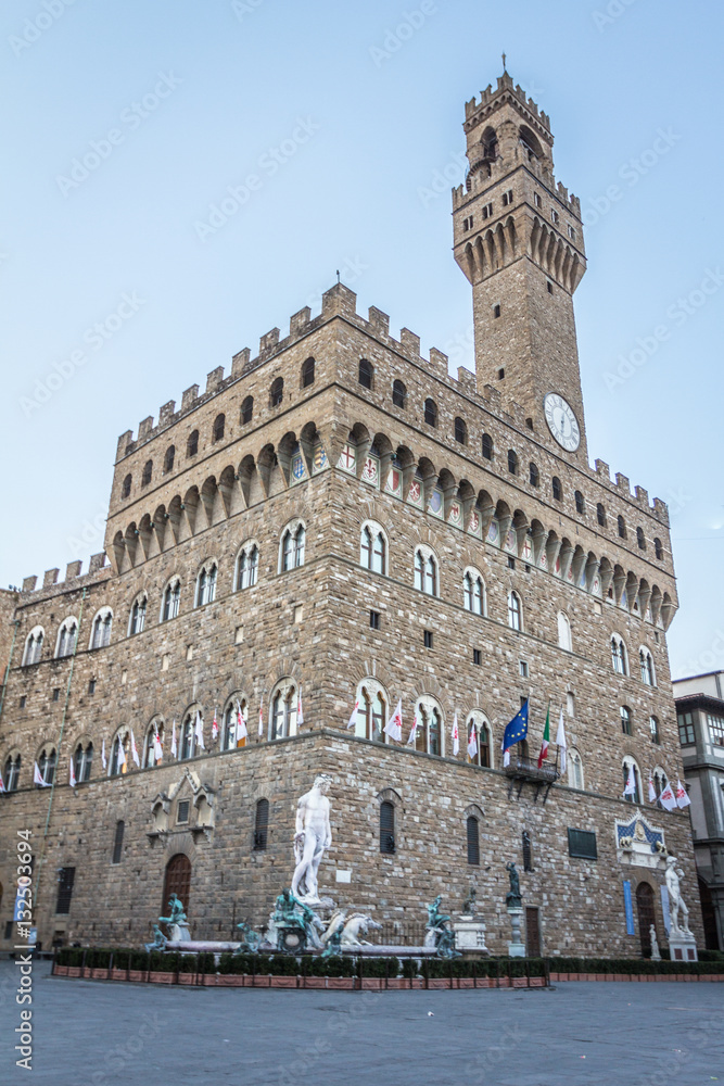 The clock tower of the Old Palace Signoria Square, Florence Italy