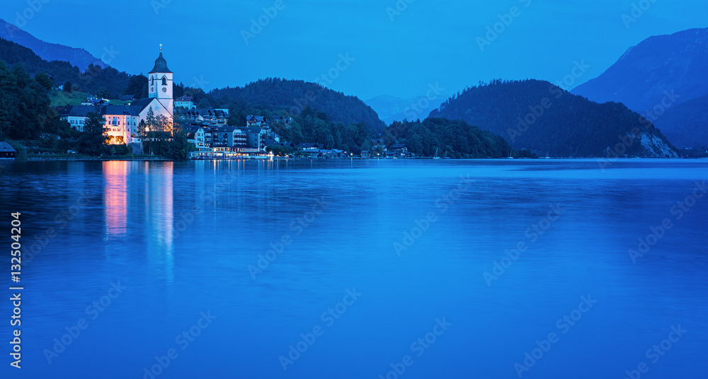 View on the lakefront of the city of St. Wolfgang, Austria in blue hour