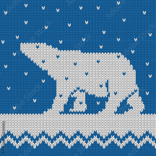 Knitted winter blue seamless pattern with polar bear with snow