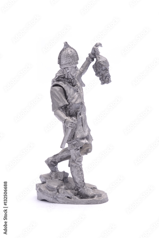 tin soldier medieval knight with severed head isolated on white