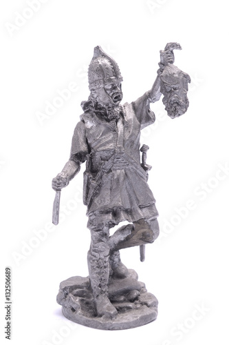 tin soldier medieval knight with severed head isolated on white