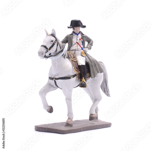 Tin Soldier Napoleon on horseback isolated on white © vitaly tiagunov