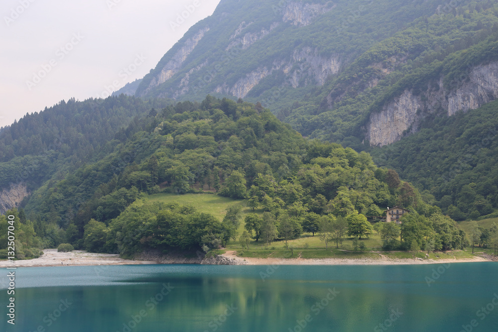 Blue mountain lake Tenno in Italy at summer Blue mountain lake Tenno in Italy at summer