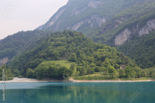 Blue mountain lake Tenno in Italy at summer