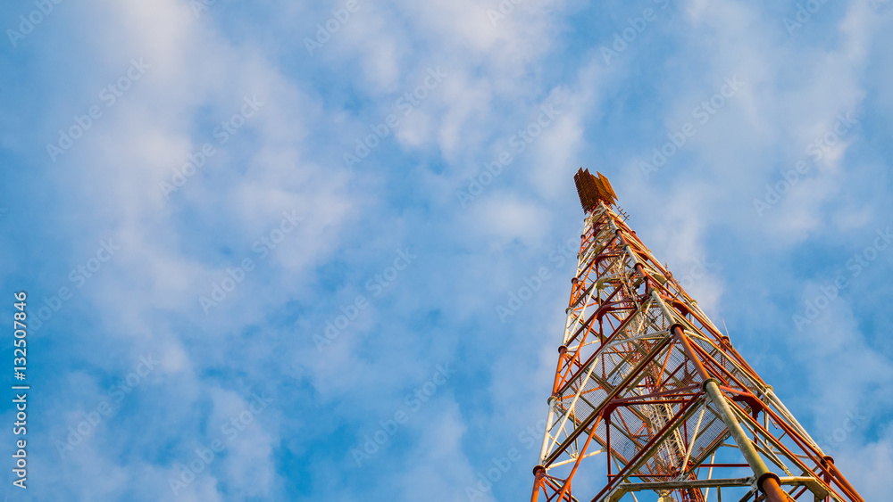 telecommunication tower with blue sky background.