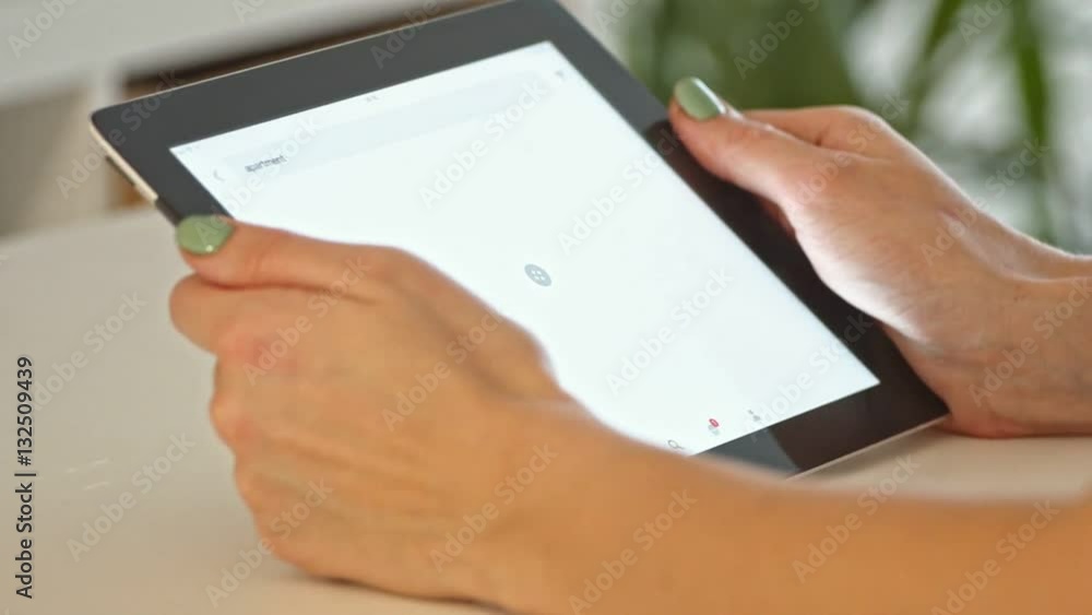 Young Woman Using Tablet Computer Online Shopping at Home. Slow motion Young Woman Using Tablet Computer Online Shopping at Home. Slow motion