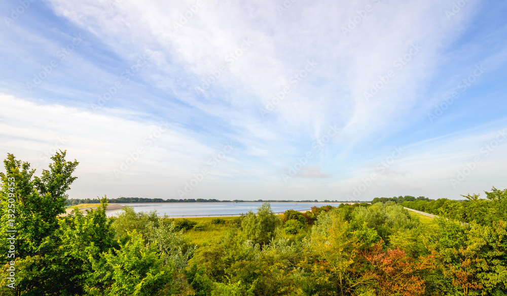 View over a large drinking water basin outdoor View over a large drinking water basin outdoor