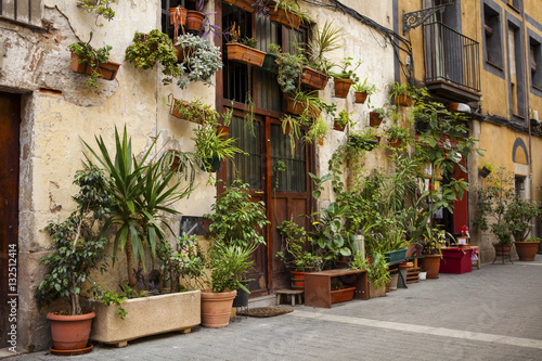 Old house in Barcelona  decorated with flowers