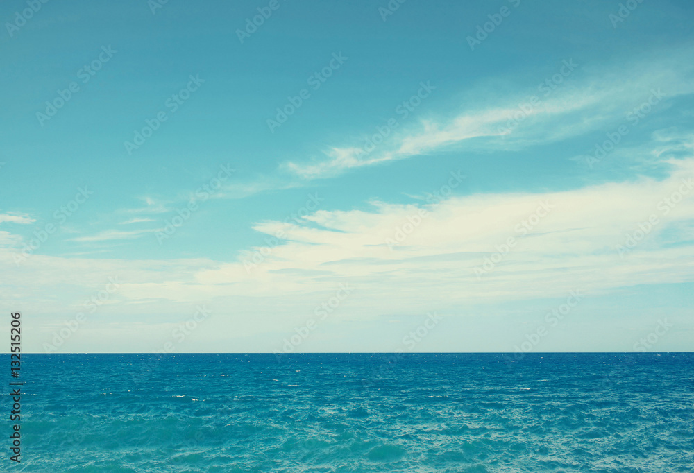 Vintage sea and blue cloudy sky background