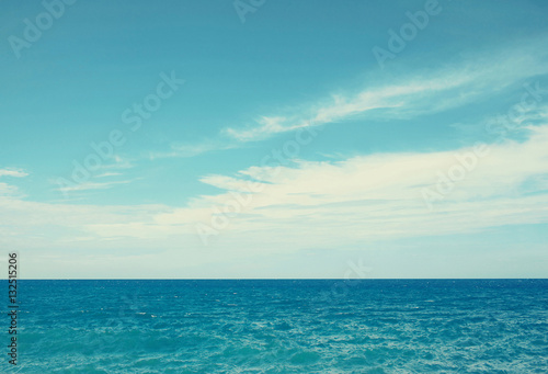 Vintage sea and blue cloudy sky background