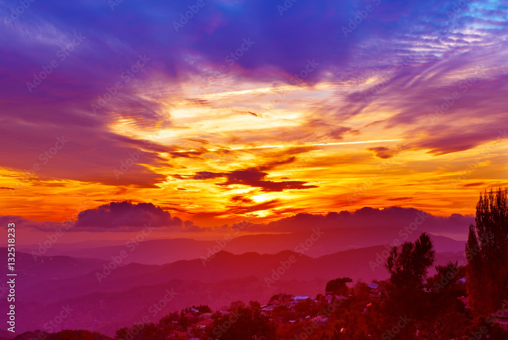 Fototapeta premium Amazing mountain landscape with colorful vivid sunset on the bright sky, natural outdoor travel background
