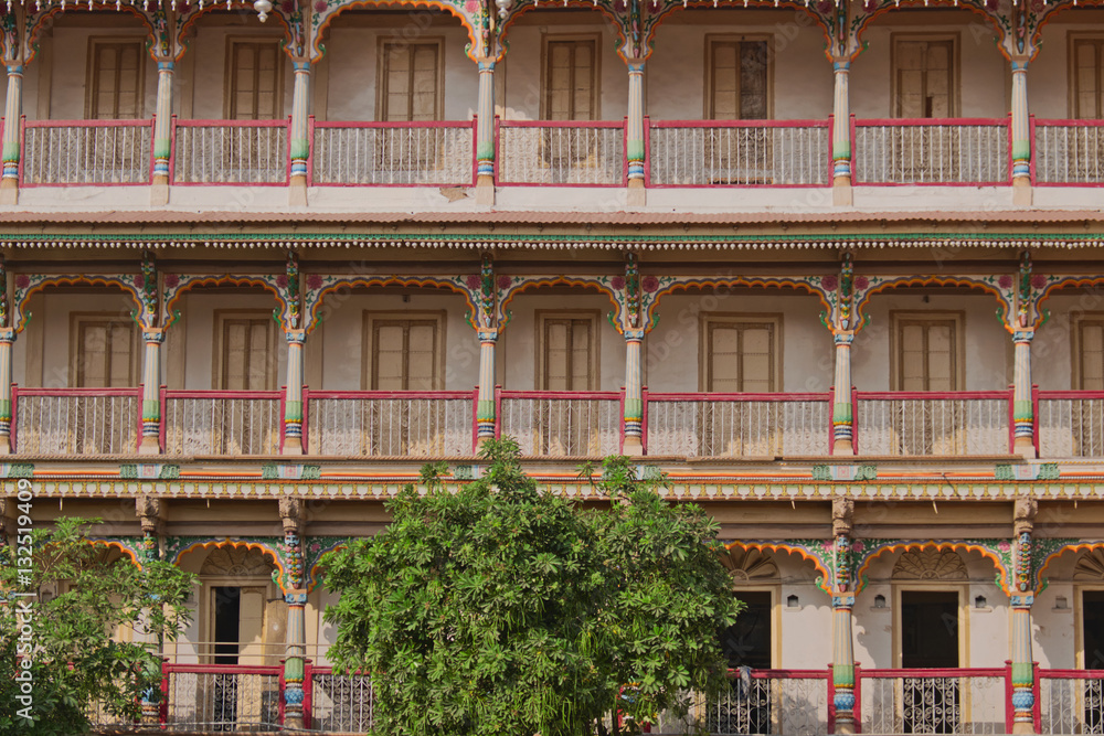 Naklejka premium Architectural detail from residential buildings for devotees of the Shri Swaminarayan Hindu sect in Ahmedabad, India