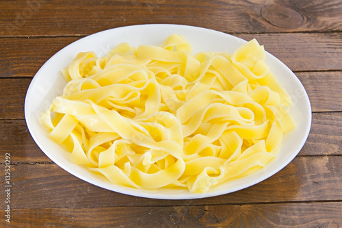 delicious fettuccine pasta  on  white plate