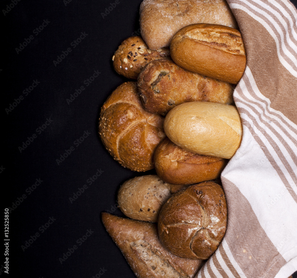 Assortment of baked goods on black table