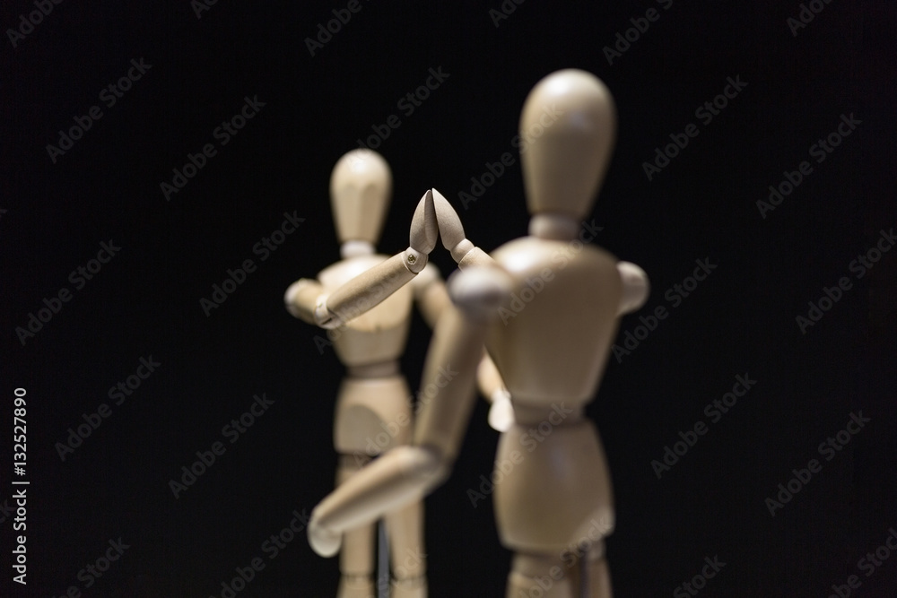 Wooden Mannequins-hi5-close-focusBlur-overshoulder 02 Wooden Mannequins-hi5-close-focusBlur-overshoulder 02