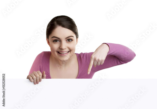 woman excited pointing looking down 