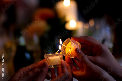 pass the fire of candles
