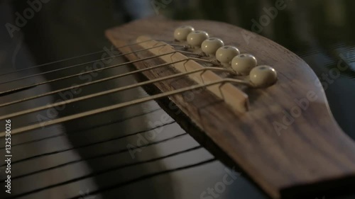 Bridge and saddle of an acoustic guitar