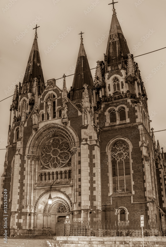 Ancient monument - facade of Gothic church in sepia