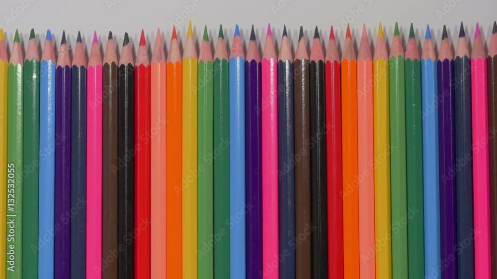 Set of multicolored pencils moving from right to left, sharp ends, pluralism, art, tools for expressing imagination, art. Stop motion. Close up, 4K Ultra HD. Set of multicolored pencils moving from right to left, sharp ends, pluralism, art, tools for expressing imagination, art. Stop motion. Close up, 4K Ultra HD.