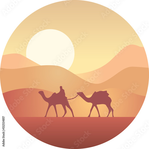 Bedouin leading a caravan of camels in the desert at sunset