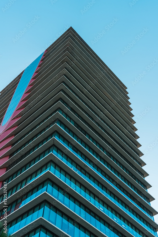 Tall building with ledges on each storey