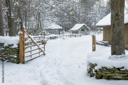 Wallpaper Mural view of an ancient farm in the winter season. The medieval architecture of Estonia, which is in the Museum under the open sky in Tallinn. Historic tourist attraction in Estonia. Torontodigital.ca