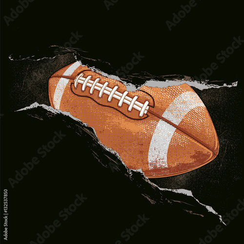 American football ball behind a rip