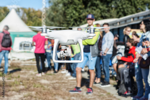 Man controls the copter.