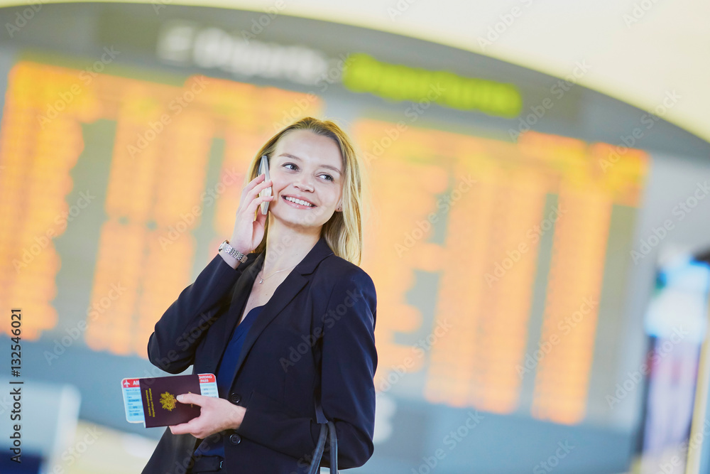 Young business woman in international airport Young business woman in international airport