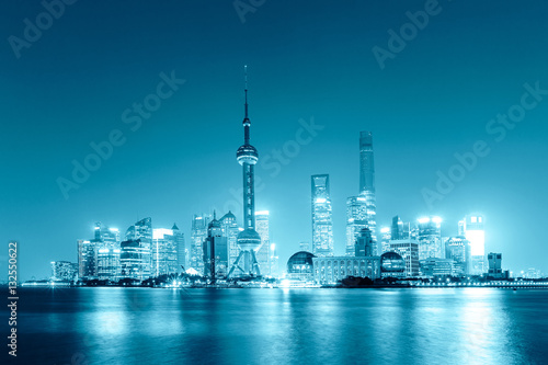 Beautiful Shanghai skyline at night modern urban background