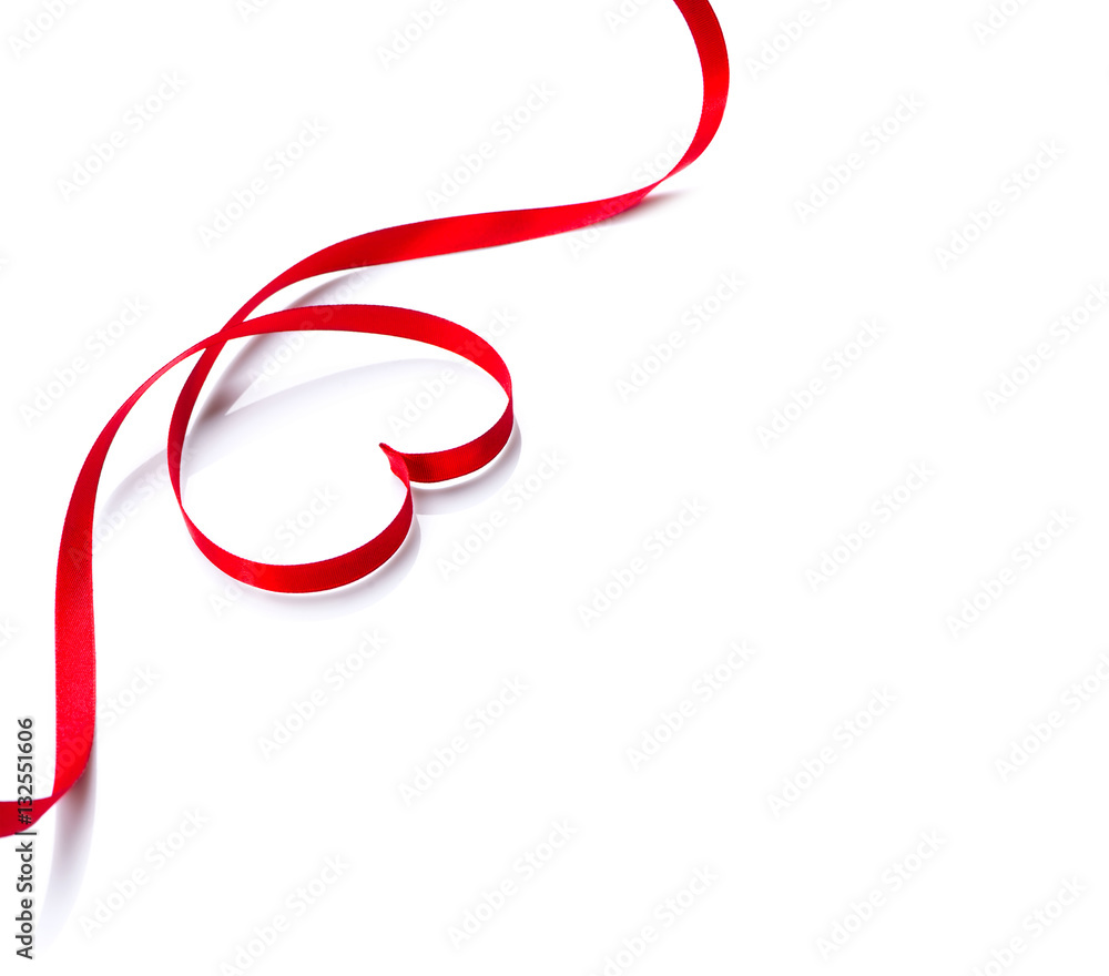 Valentine's day background. Red heart shaped satin gift ribbon isolated on white Valentine's day background. Red heart shaped satin gift ribbon isolated on white