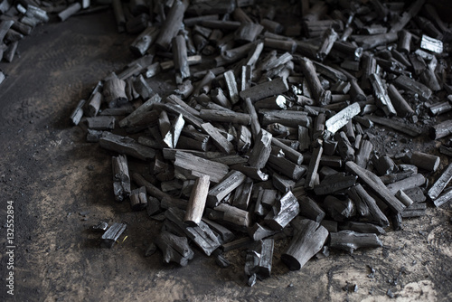 Black charcoal in the charcoal factory texture background