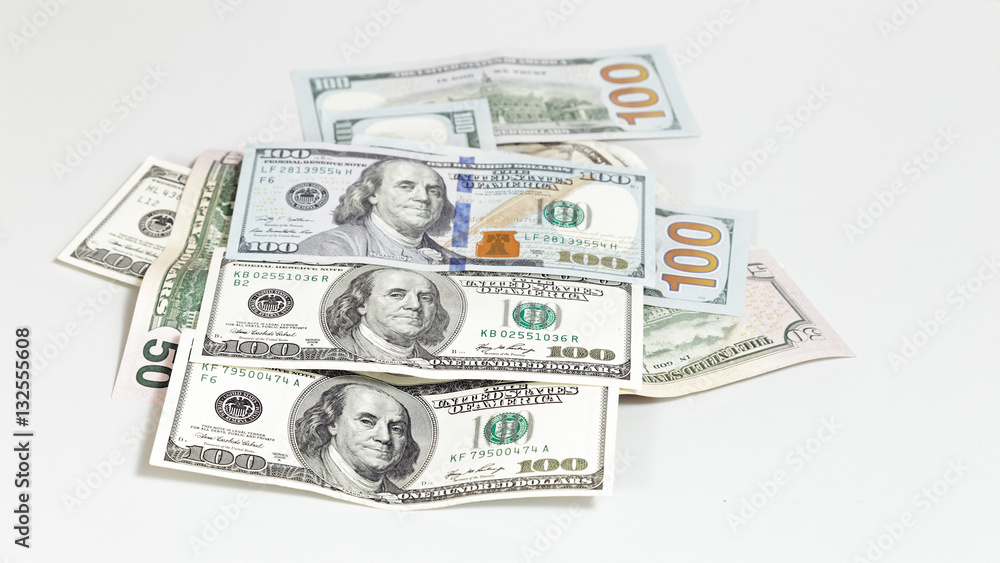 One hundred dollars banknotes on white background One hundred dollars banknotes on white background