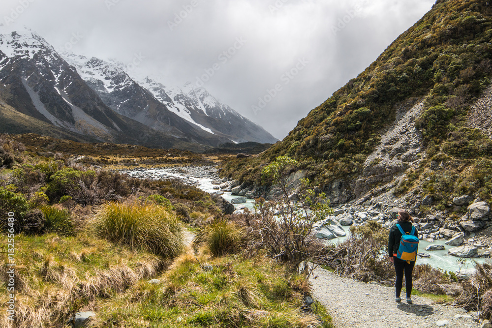 Woman Looking Into Mount Cook National Park, New Zealand
