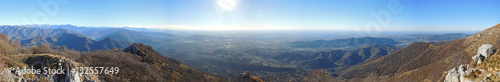 Great landscape with fantastic blue sky on the Orobie Alps and Padana plain a dry winter season without snow. Panorama from Linzone Mountain  Bergamo  Italy. 
