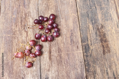 Grape red fresh Select focus with shallow depth of field on wooden table background