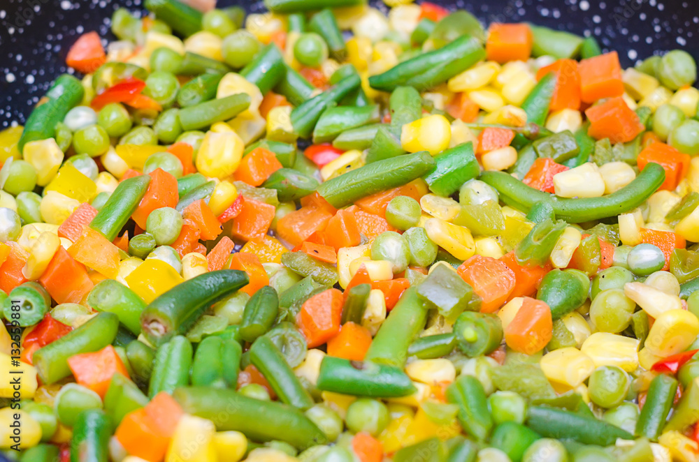 stewed sliced vegetables in a pan stewed sliced vegetables in a pan