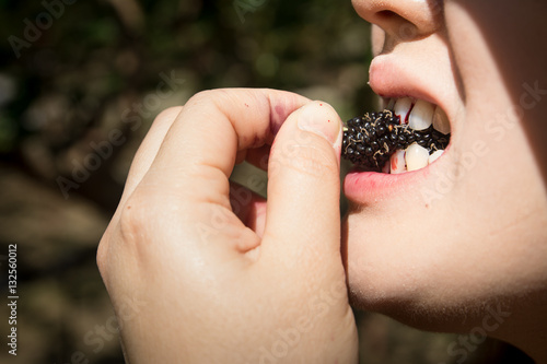 The sour expression, Biting a mulberry