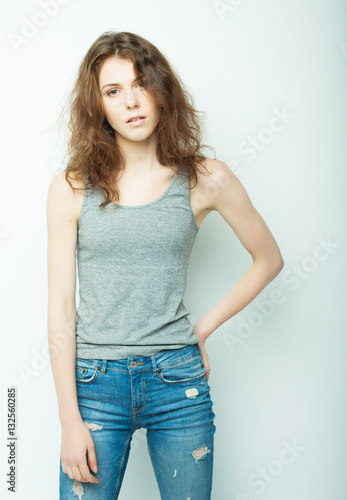 lifestyle, fashion and people concept: beautiful woman wearing casual clothes, posing on white background