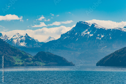 View of Lucerne lake with Swiss alps from a ferry  Switzerland - April  2016