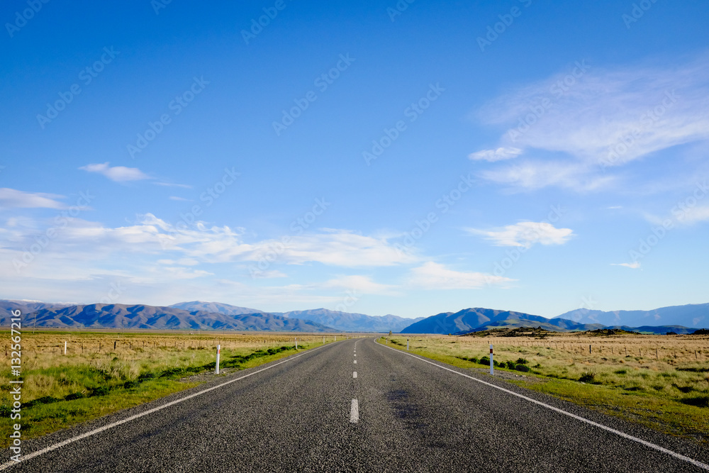 Highway 8, the road between Lake Tekapo and Lake Pukaki in the South Island, during spring season of New Zealand.