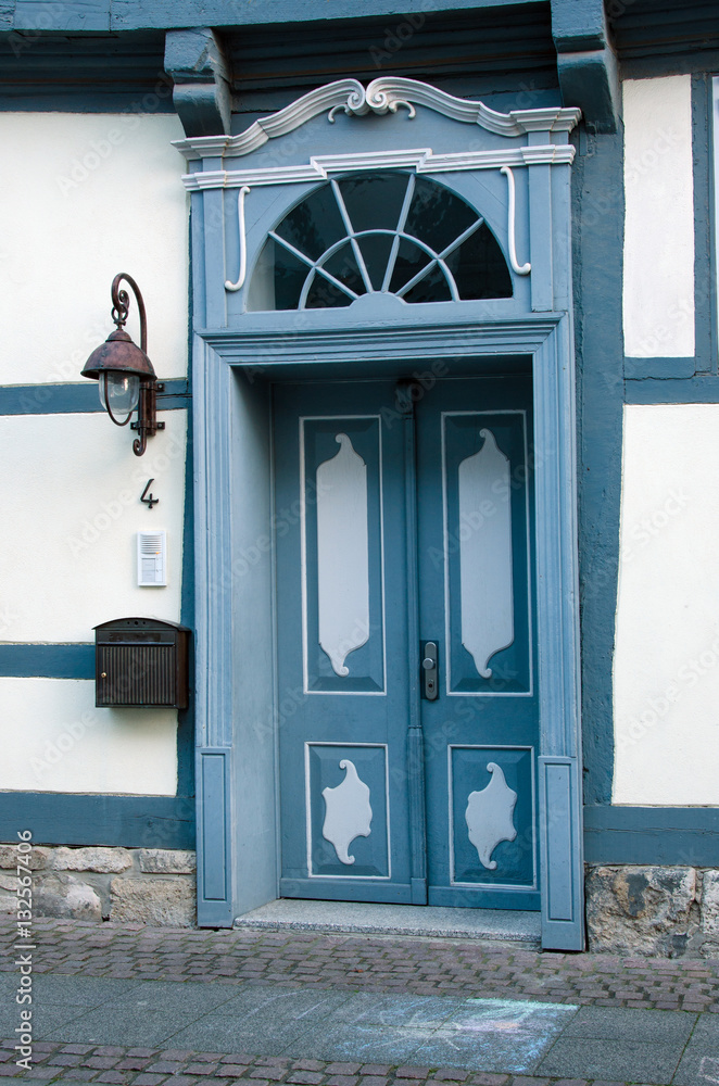 Beautiful old wooden door at the entrance to the house