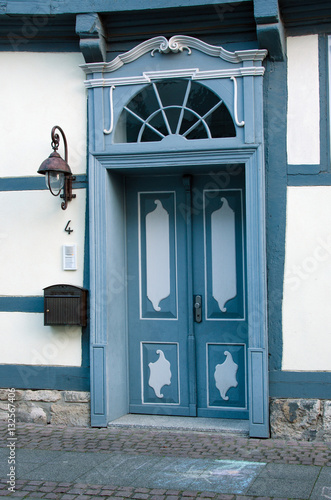 Obraz na płótnie Beautiful old wooden door at the entrance to the house w salonie