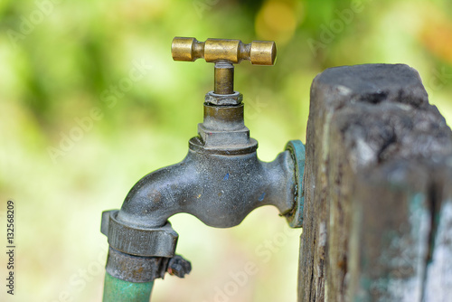 Old faucet background