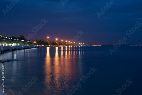 Reflection light on the sea from the bech with twilight sky. © arnuphapy
